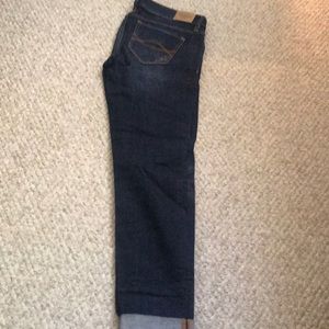 Dark wash lightly destroyed jeans